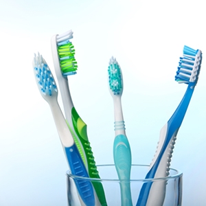 Between the sharpen toothbrush and the cut end toothbrush, which one should the hyper sensitive person use?
